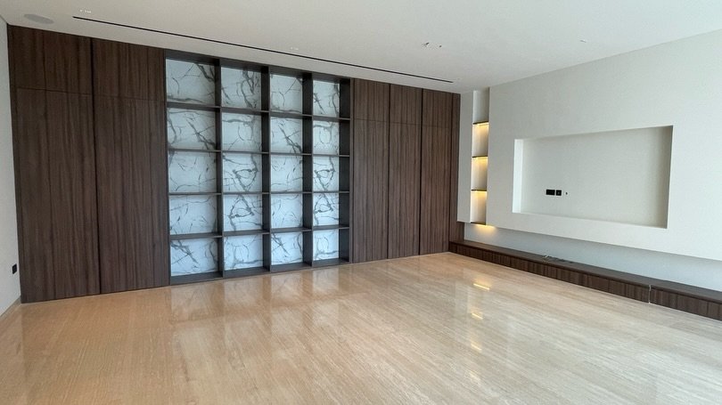 Star photographed fitted wood and stone feature wall